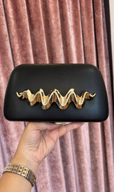 Clutch Negro y Oro